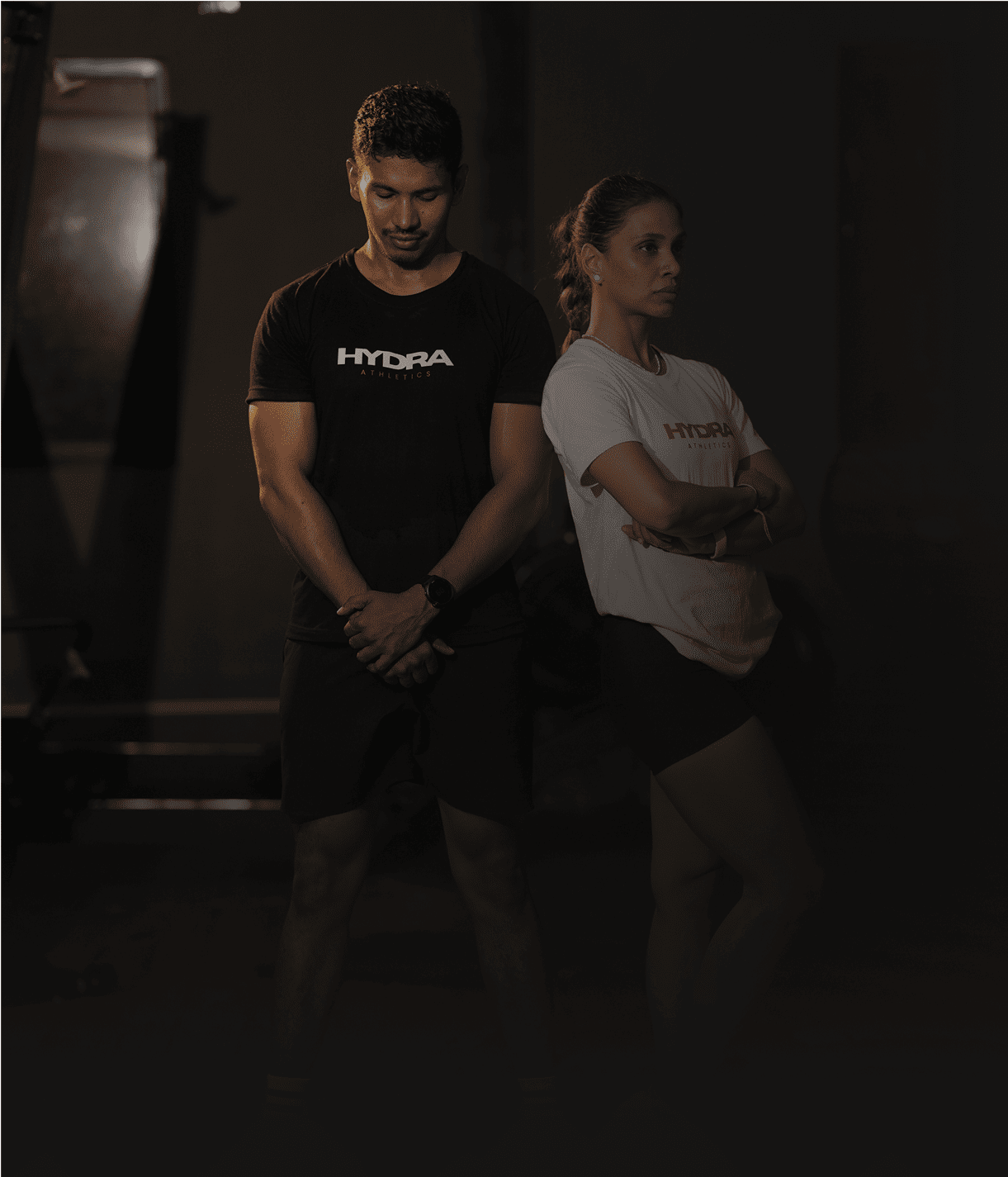 Athletes training for the Grit & Grind Challenge at different fitness stations